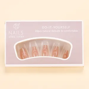 Close-up of pink cat-eye coffin nails packaging showing 30pcs DIY set details