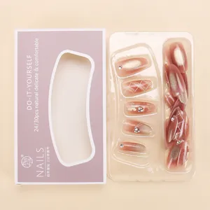 Detailed set of 30 gradient pink cat eye press-on nails with rhinestones in a gift box