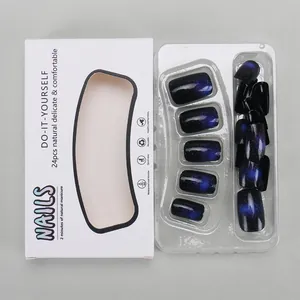 Short galaxy cat-eye press-on nails in deep blue with 24 pieces and packaging