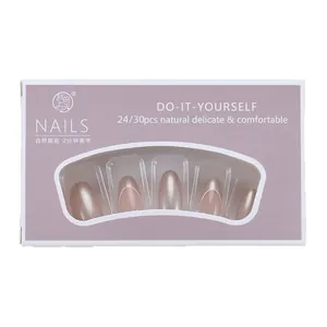 French style gold-rimmed press-on nail kit with pearlescent cat eye effect in purple box
