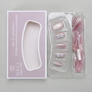 Detail of purple cat-eye press-on nail kit with glitter finish in branded packaging