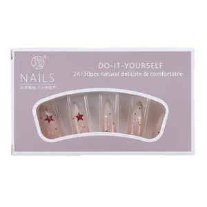 Purple press-on nail kit with pink gradient, star patterns and almond-shaped tips