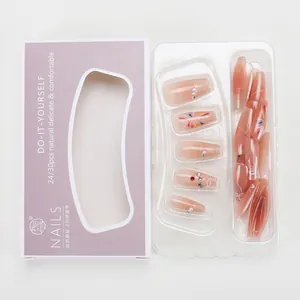 Detail of gradient cat-eye press-on nails with rhinestones and pearl firework accents