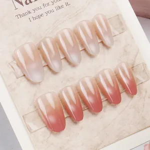 Detailed view of long oval press-on nails with cat-eye cat gradient and glossy finish