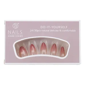 Pink gradient cat-eye press-on nails set in a purple window display gift box