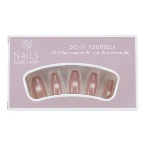 Press-on nails set in nude cat-eye style featuring a 24-piece pack in a window box