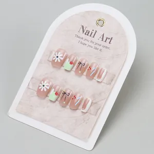 Short coffin press-on nails set with sweet daisy floral and cute bow designs