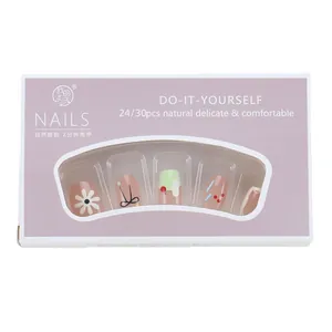 Short coffin press-on nails set with sweet daisy and bow designs in purple packaging