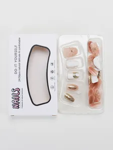 Detailed set of nude pink press-on nails with pearls and premium packaging box
