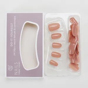 Detail of matte nude press-on nails set with 24 pieces in purple packaging box