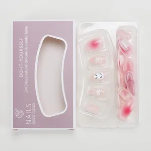 Juego de uñas postizas rosa degradado con lindos diseños de gatos y estrellas en caja