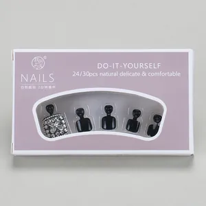 Press-on toenails set featuring glossy black finish and sparkling rhinestone accents