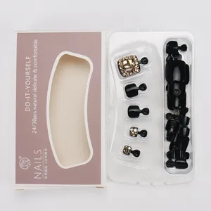 Faux ongles noirs pour pieds avec strass dorés en kit de 24/30 pièces avec emballage
