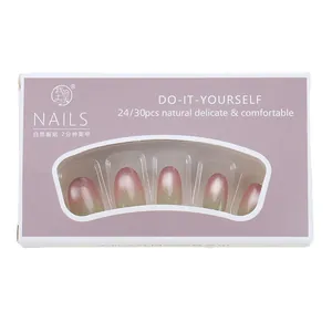 Pink and green gradient cat eye press-on nails set with glitter in purple box