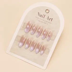 Pink and purple gradient cat-eye press-on nails in long round shape with high gloss finish