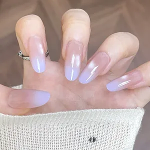Pink and purple gradient cat eye press-on nails with a glossy finish and oval shape