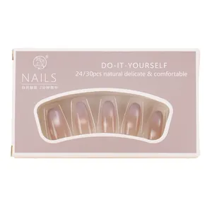 Cat eye press-on nails set with purple gradient in a minimalist display box