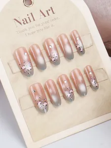 Detail view of 10-piece gradient leopard print press-on nails with shiny rhinestones