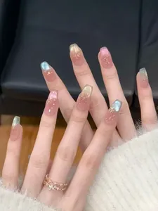 Detail of long coffin press-on nails with aurora cat-eye gradient and shimmer finish