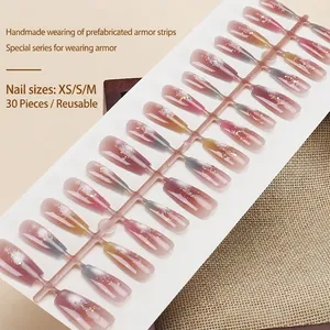 Pink and purple gradient press-on nails with gold foil in 30-piece reusable set