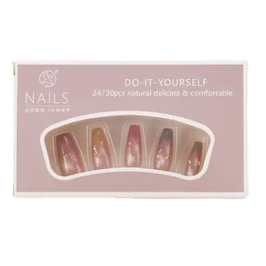 Press-on nail set with dark red to brown gradient finish and silver glitter accents