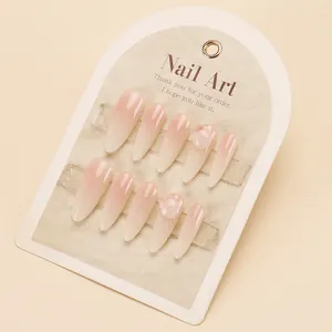 Pink and white gradient long almond press-on nails with 3D water drop accents