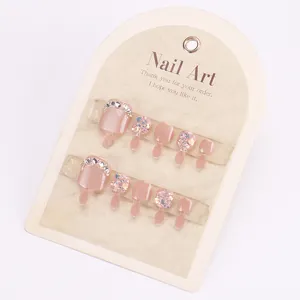 Unghie piedi finte rosa cat-eye con glitter paillettes e strass per l'estate