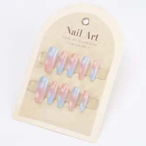 Pink and blue gradient cat eye coffin press-on nails set on beige display card