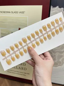 Detail view of 24pcs gradient square press-on nails set in amber and cream tones
