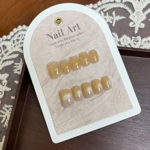 Short square champagne gold cat eye press-on nails with amber gradient and glitter
