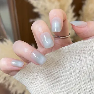 Short square-oval blue cat-eye press-on nails with elegant shimmer for women