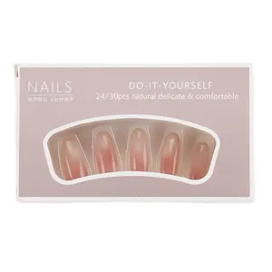 Glossy gradient pink cat eye press-on nails set in a window box packaging