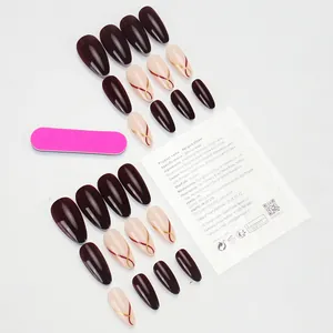 Deep burgundy and pink almond press-on nails set with elegant gold wavy line patterns