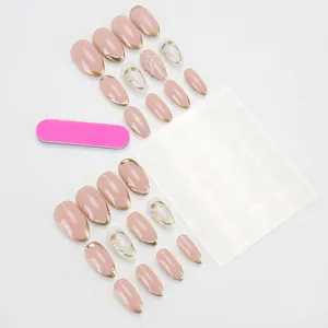 Press-on nail set with 3D shell texture, pearls and golden metallic French tips
