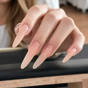 Long stiletto press-on nails with nude pink gradient and high gloss jelly finish, 30pcs