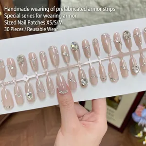 Handmade soft pink cat-eye press-on nails set with rhinestones and 30 pieces