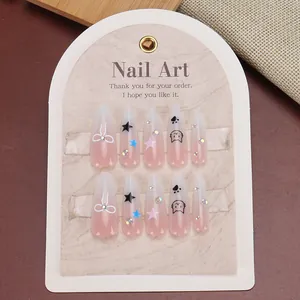 Handmade long almond gradient pink press-on nails with cartoon cat and bow charms