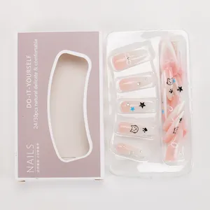 Pink gradient press-on nails set with hand-painted cat and bow motifs in package