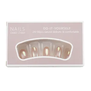 Short oval cat-eye press-on nails with gradient pink Aurora shimmer and glass bead finish
