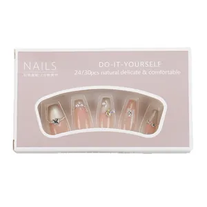 Handmade gradient press-on nails with 3D butterflies and pearls in elegant packaging