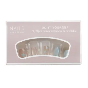 Short cream style press-on nails set with blue cat-eye and star patterns for students
