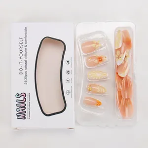 Reusable almond press-on nails with 3D floral pattern and pearl star charms in a box