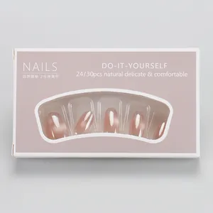 Detail view of pink cat-eye press-on nails in rectangular box with transparent window