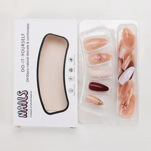 Set di 24 unghie finte con bordi dorati, fiocchi 3D e finitura rosa lucida