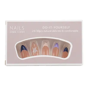 Almond shaped press-on nails with navy blue french tips and black star pattern