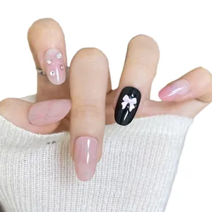Cat-Eye Kunstnägel Set in Rosa mit 3D Schleifen und Strasssteinen in ovaler Form