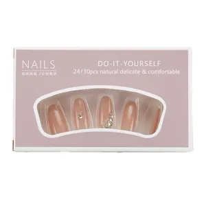 Handmade nude pink press-on nails set with rhinestones and glitters, medium oval shape