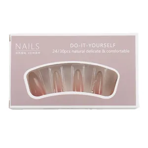Pink gradient almond press-on nails set with pearls and rhinestones in purple window box
