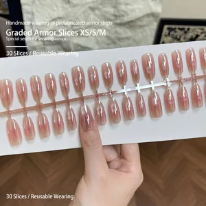 Handmade pink blush gradient press-on nails set with 30 pieces in oval glossy finish
