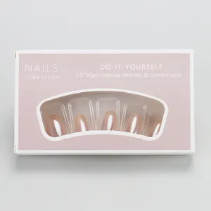 Close-up of pink cat eye press-on nails in a professional 24-piece retail display box